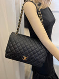 Pre Loved Chanel Classic Maxi Double Flap Bag in Black Caviar Leather