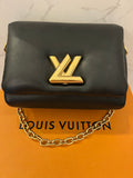 Pre Loved Louis Vuitton Twist MM Padded in Black Leather (excellent)