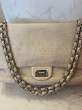 Pre Loved Chanel 2.55 Re-issue flap bag in cream embossed leather with matching purse