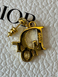 Pre Loved Dior Gold Plated Earrings feature DIOR letters with crystal detail (excellent)