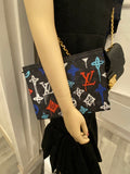 Pre Loved Louis Vuitton Louis Vuitton Pochette Voyage MM in Graffiti Multicolor (as new)