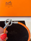 Pre Loved Hermes Glenen H Bracelet in orange braided calfskin with silver hardware