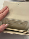 Pre Loved Chanel 2.55 Re-issue flap bag in cream embossed leather with matching purse