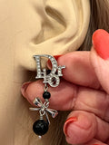 Pre Loved Dior silver plated clip on crystal accent earrings with bow & black faux pearls (excellent)