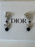 Pre Loved Dior silver plated clip on crystal accent earrings with bow & black faux pearls (excellent)