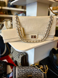 Pre Loved Chanel 2.55 Re-issue flap bag in cream embossed leather with matching purse
