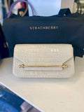 Pre loved Strathberry East/West clutch in beige embossed leather (excellent)