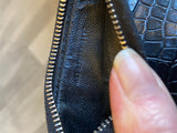 Saint Laurent Fragments Zipped Card Case in Black Embossed Leather