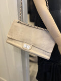 Pre Loved Chanel 2.55 Re-issue flap bag in cream embossed leather with matching purse