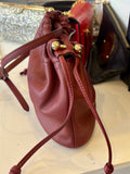 Pre loved Strathberry Charlotte drawstring handbag in burgundy leather