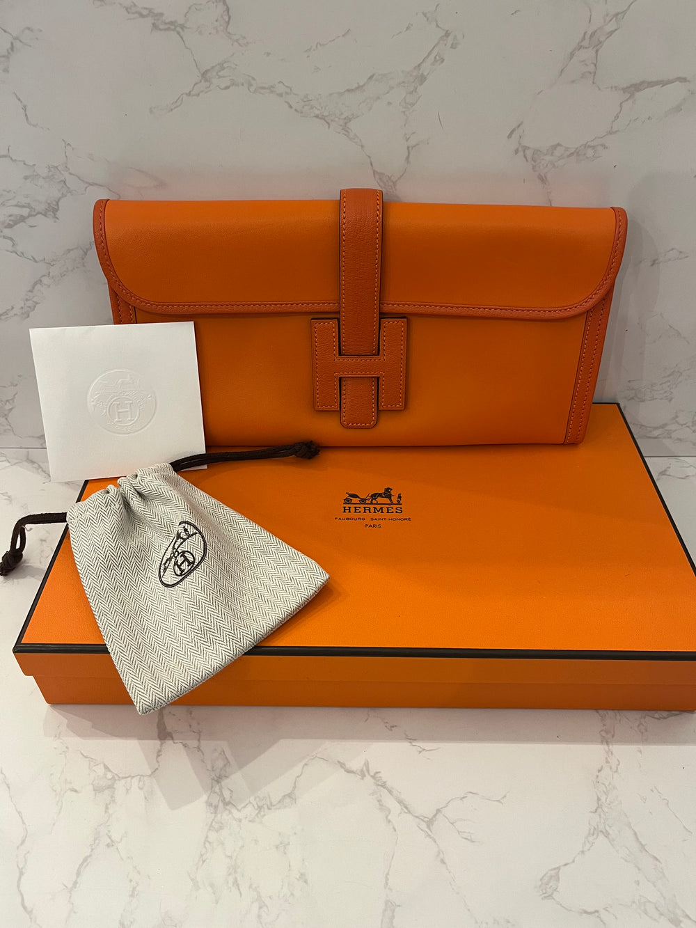 Pre Loved  Hermes Jige Elan 29 Clutch in Orange Swift Leather (excellent)