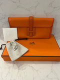 Pre Loved  Hermes Jige Elan 29 Clutch in Orange Swift Leather (excellent)