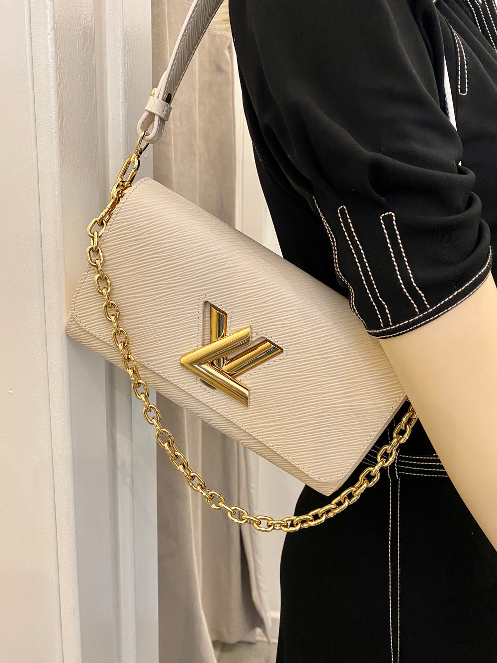 Pre Loved Louis Vuitton Twist West Bag in Quartz - NEW