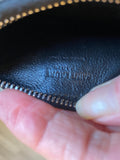 Saint Laurent Fragments Zipped Card Case in Black Embossed Leather