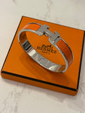 Pre Loved Hermes Orange Enamel Clic H Narrow Bangle size