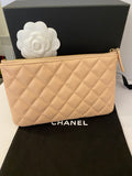 Pre Loved Chanel Peach Caviar Leather O-Case (excellent)