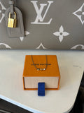 Pre Loved Louis Vuitton Petit Louis Necklace in gold tone featuring LV circle & flower charms