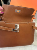 Pre Loved Hermes Kelly Depeches 25 pouch  in Gold Leather with Palladium Hardware