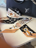 Pre Loved Louis Vuitton Twilly - black, gold & white colours