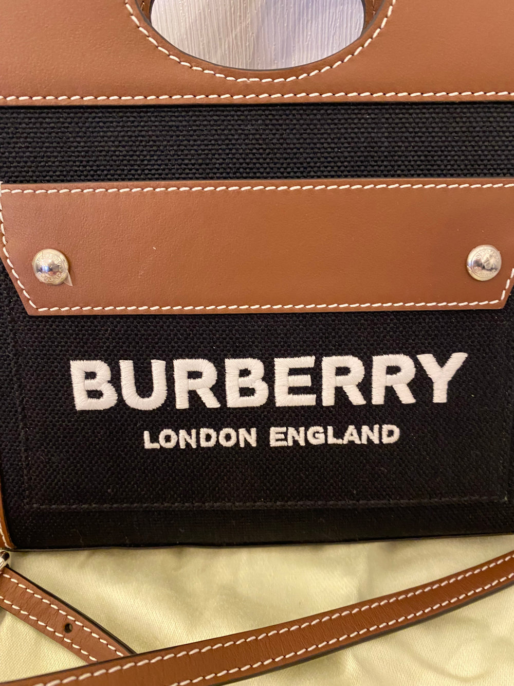 Burberry Micro Canvas pocket top handle bag (new)