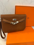 Pre Loved Hermes Kelly Depeches 25 pouch  in Gold Leather with Palladium Hardware