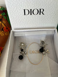 Pre Loved Dior silver plated clip on crystal accent earrings with bow & black faux pearls (excellent)