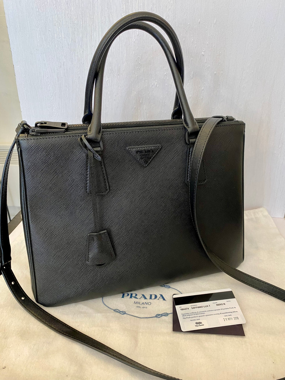 Prada black leather bag best sale