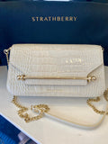 Pre loved Strathberry East/West clutch in beige embossed leather (excellent)