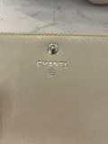 Pre Loved Chanel 2.55 Re-issue flap bag in cream embossed leather with matching purse