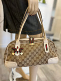 Pre Loved Gucci Vintage Princy Bag in GG Monogram Canvas with Leather Handles