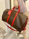 Pre Loved Louis Vuitton Monogram Keepall 50 With Red Leather Trim (excellent)