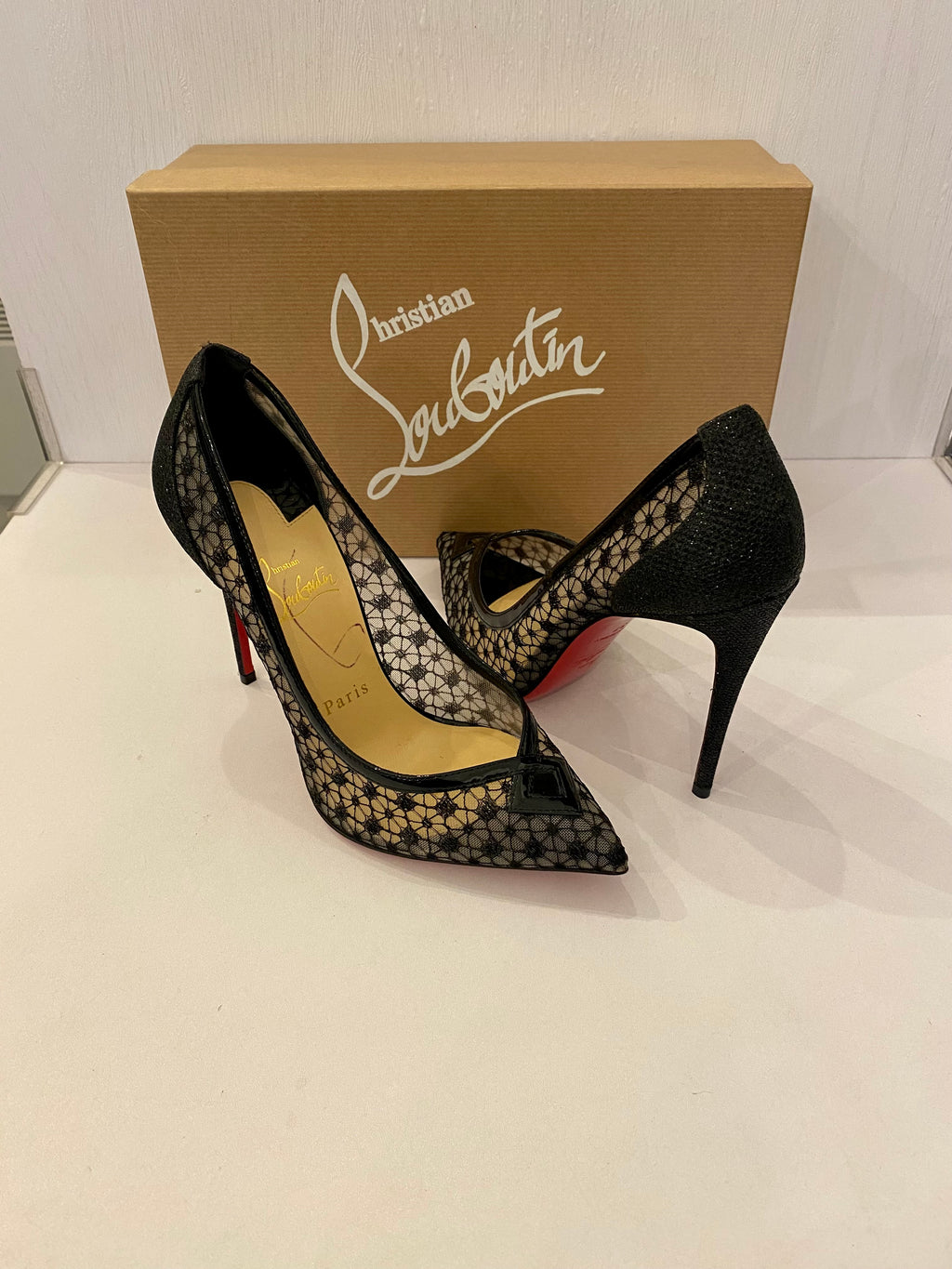 Black lace louboutin heels online