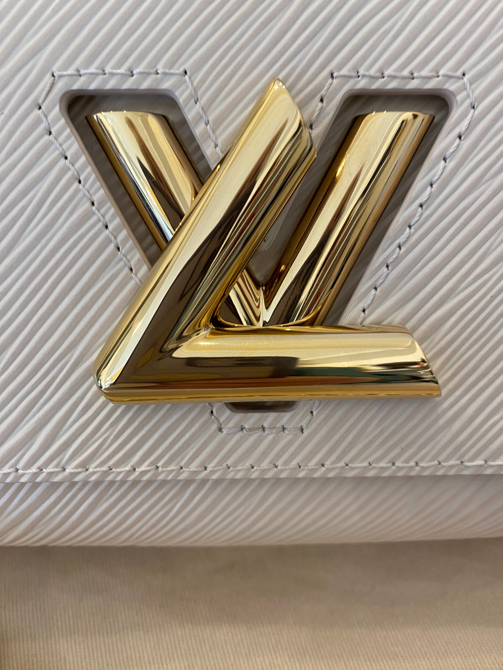 Pre Loved Louis Vuitton Twist West Bag in Quartz - NEW