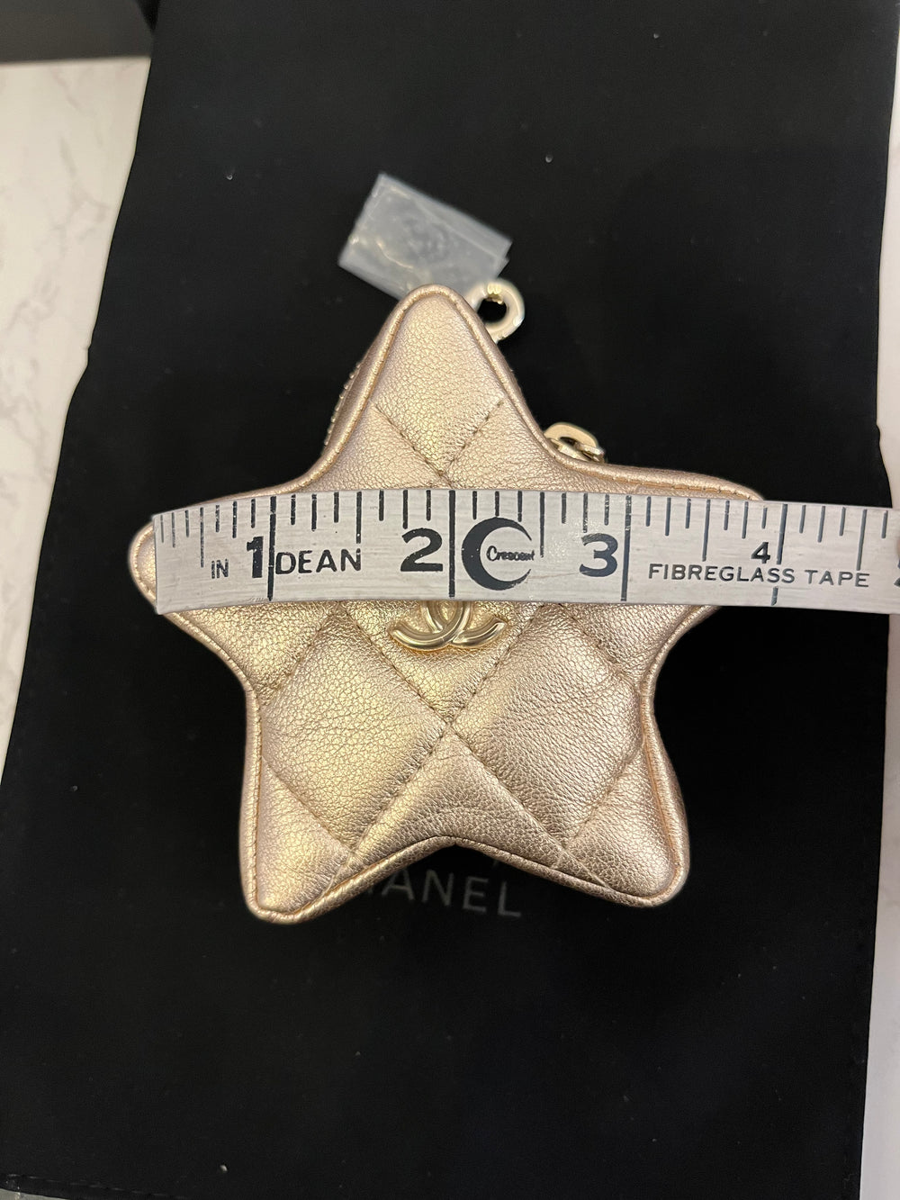 Pre Loved Chanel Walk Of Fame Star Coin Holder in Gold Leather (new)