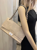 Pre Loved Chanel 2.55 Re-issue flap bag in cream embossed leather with matching purse