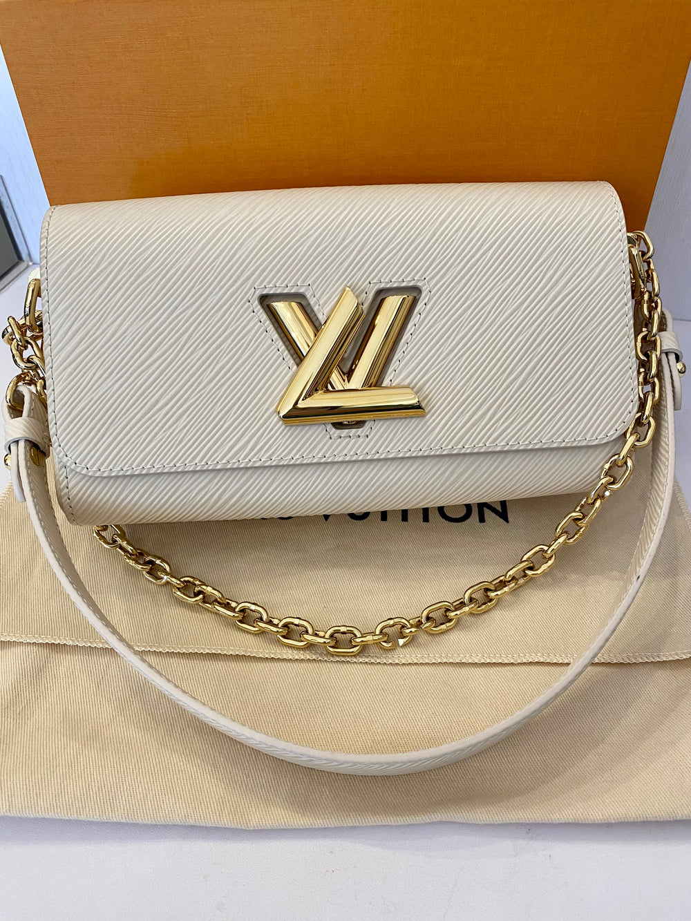 Pre Loved Louis Vuitton Twist West Bag in Quartz - NEW