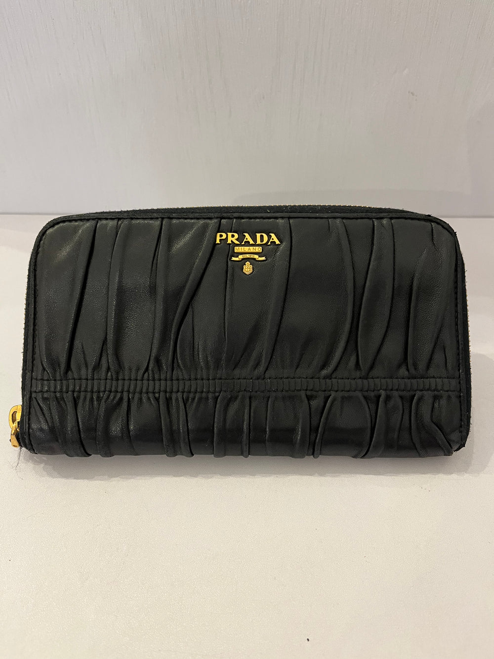 Pre Loved Prada Zip Around Matelasse Leather Purse in Black