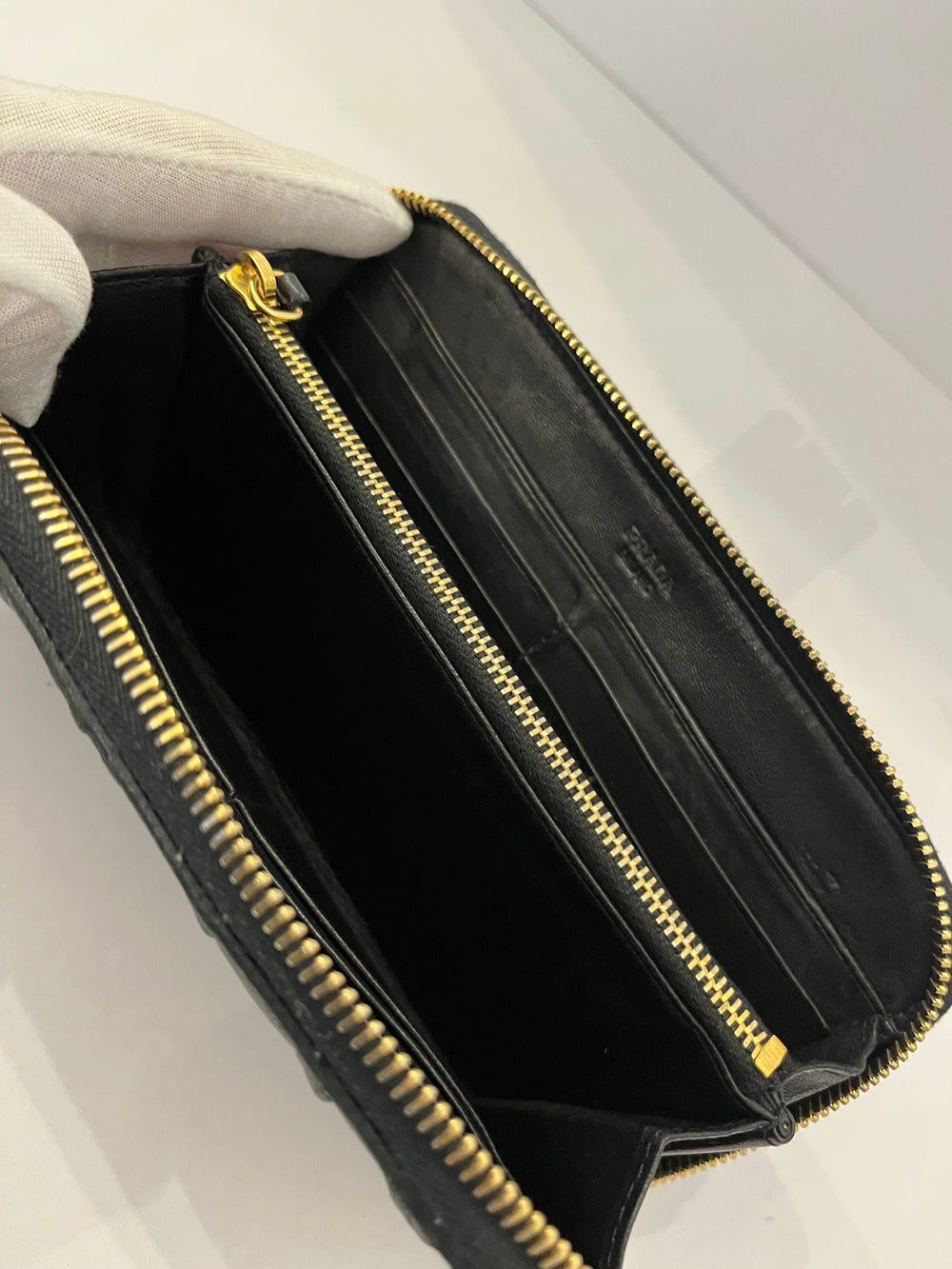 Pre Loved Prada Zip Around Matelasse Leather Purse in Black